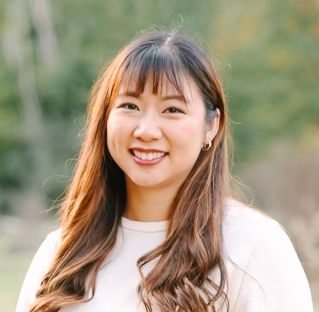 Close-up of a blooming pink rose outdoors, perfect for backgrounds or wallpapers.