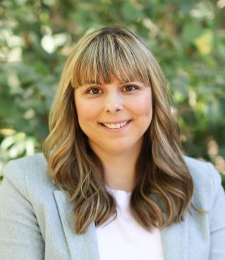Close-up of a blooming pink rose outdoors, perfect for backgrounds or wallpapers.